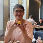 a man smiling for the camera