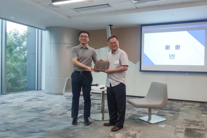 a man and a woman standing in a room