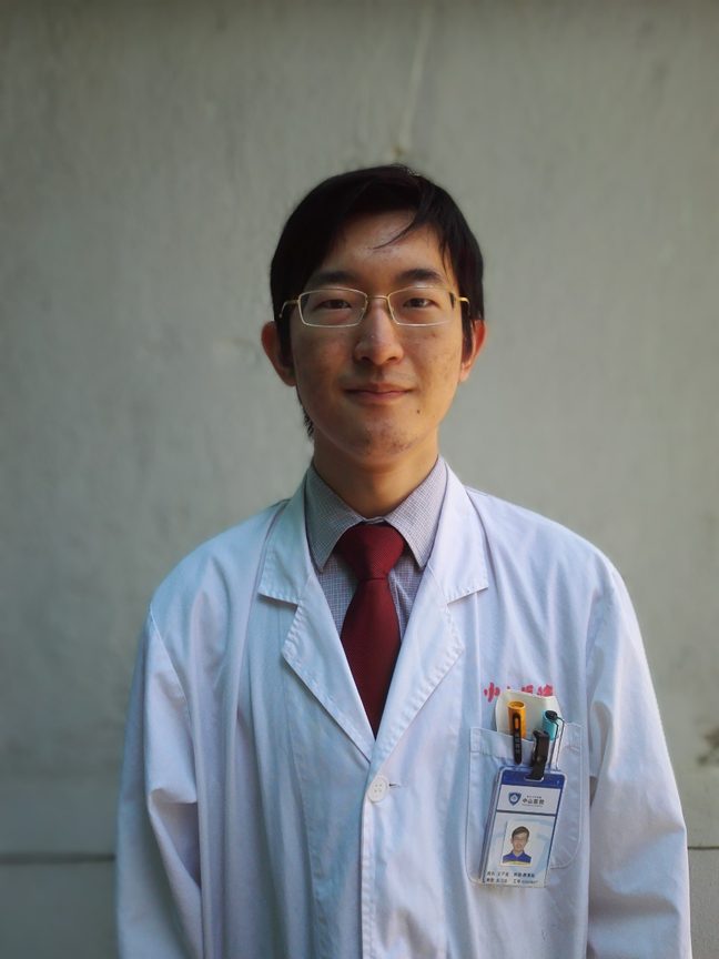 a man wearing a suit and tie smiling at the camera