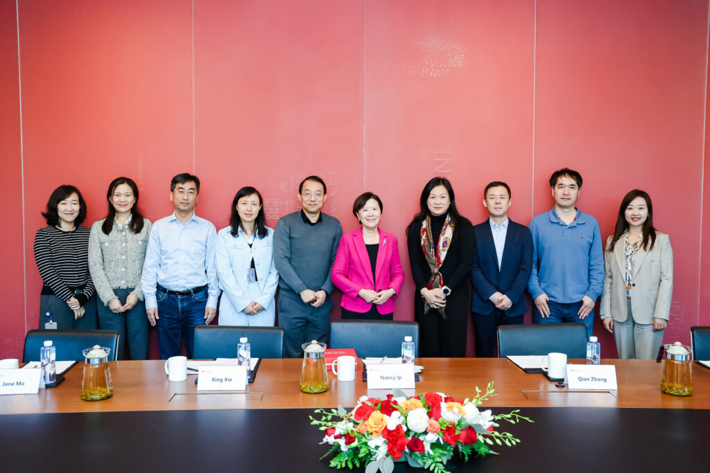 a group of people posing for a photo