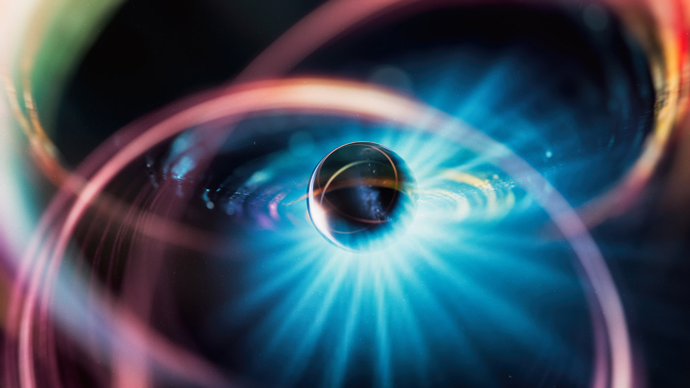 Graphic of a flashing ball with black background to represent fusion