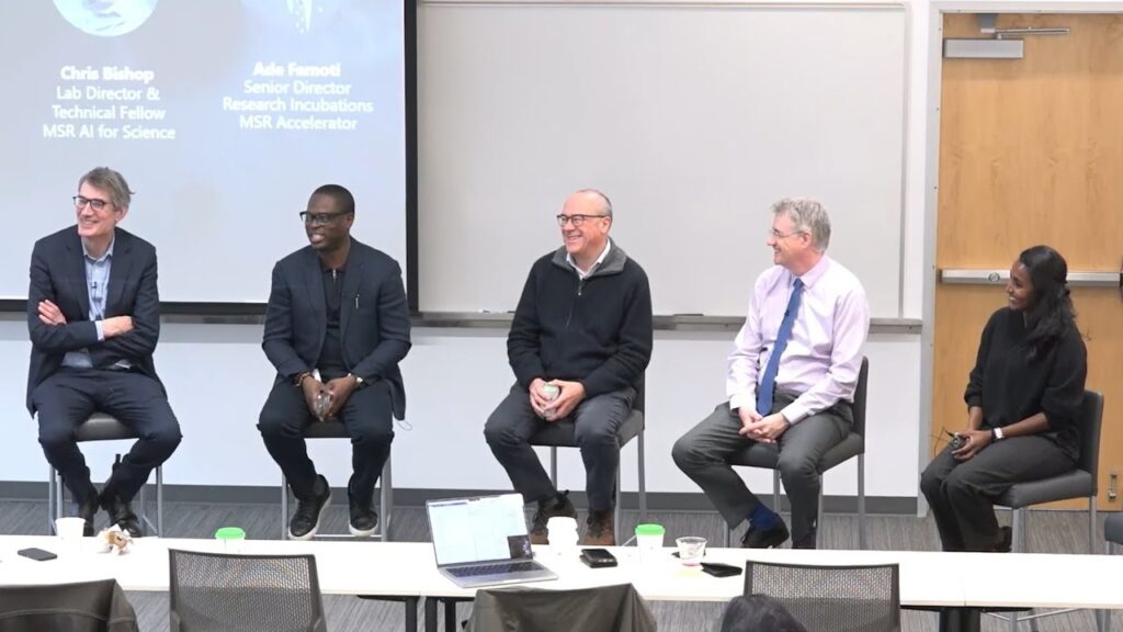 a group of people sitting in chairs