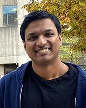 a person smiling for the camera