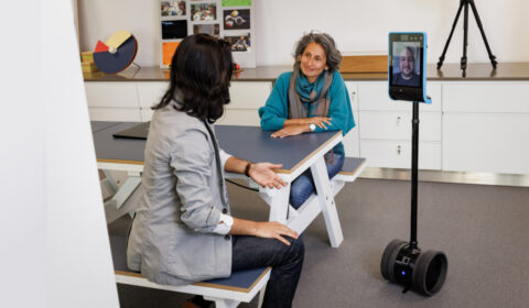 Photo of two people collaborating