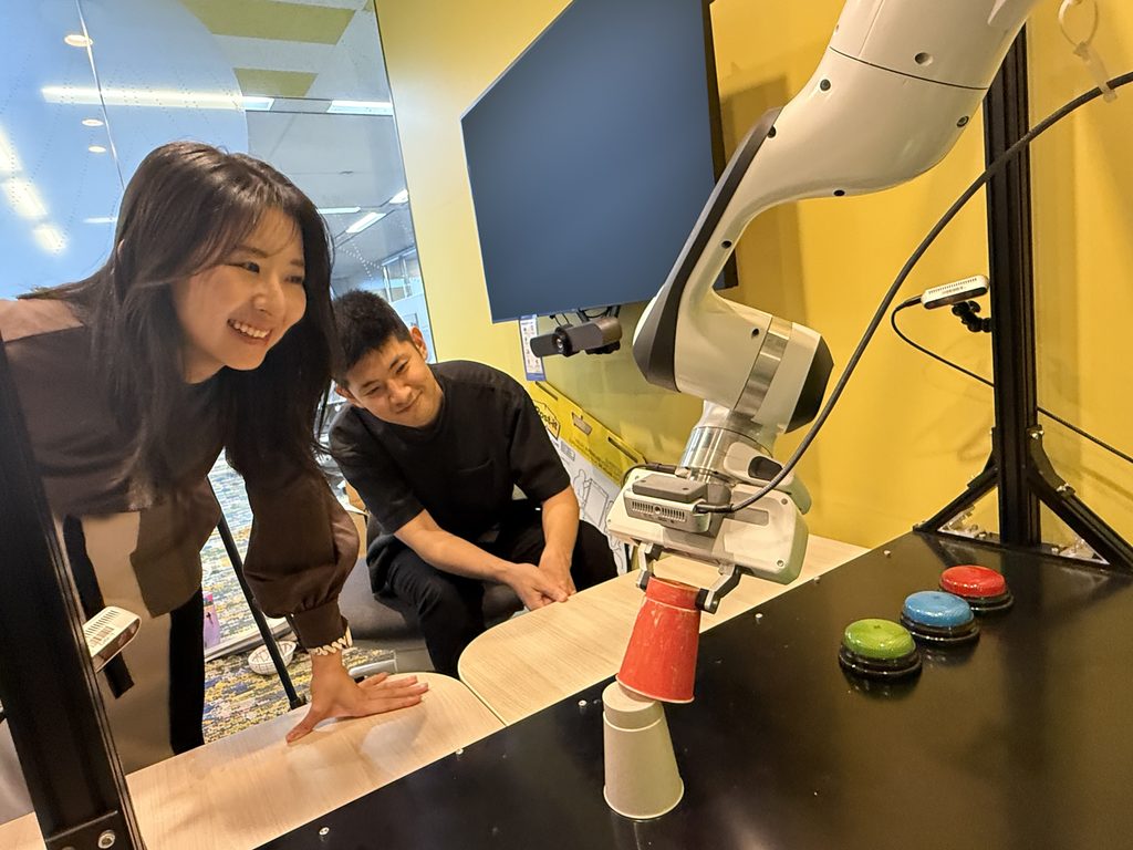 Research intern Lilika Makabe works with Microsoft Research Asia – Tokyo lab researcher Heecheol Kim to explore the connection between perception, learning, and action through real-world robotics experiments.