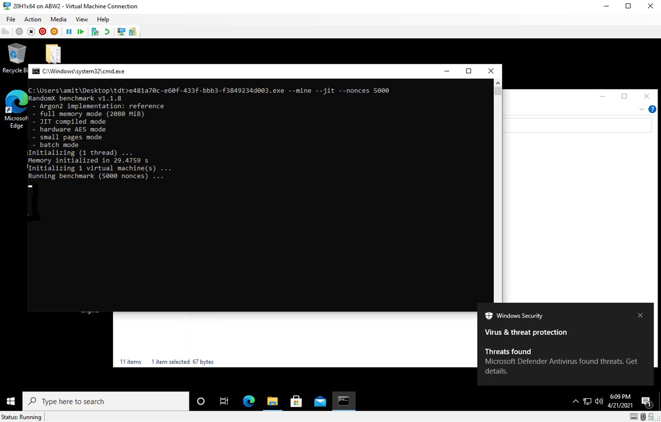 Screenshot of a Windows desktop with a notification from Windows Security about a threat that was detected by Intel TDT and Microsoft Defender. 