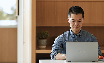 Man working on PC laptop