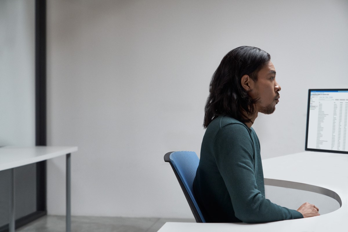 Security practitioner at work in a security operations center.