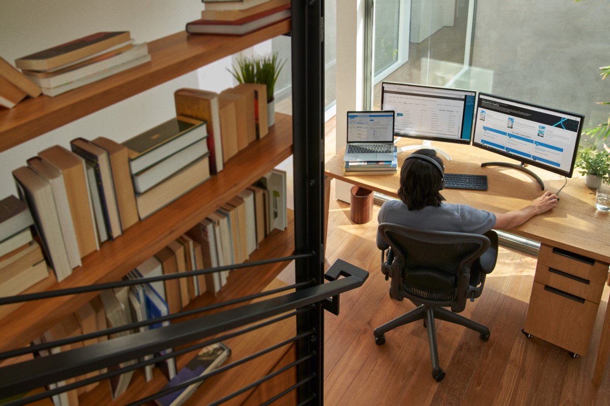 Security practitioner or information worker working from home office.