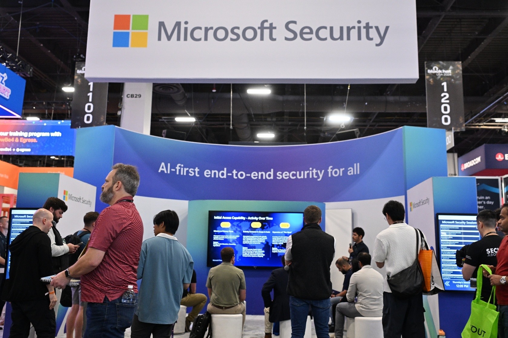 A group of people in front of a sign