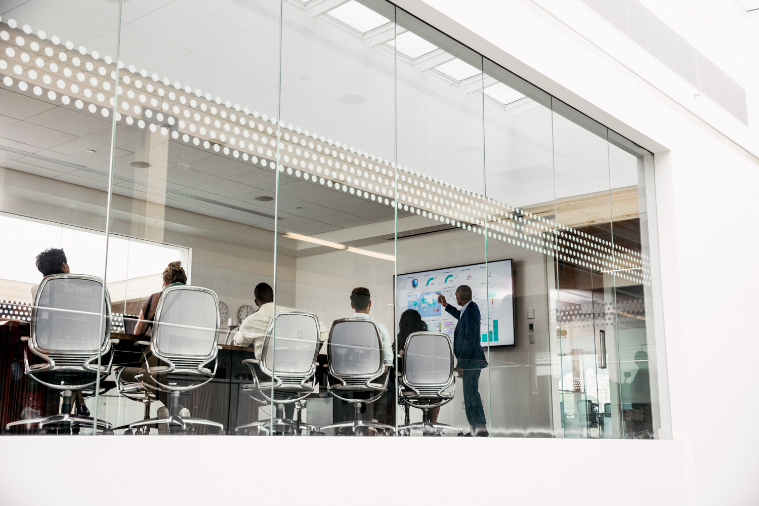 A group of people in a meeting room