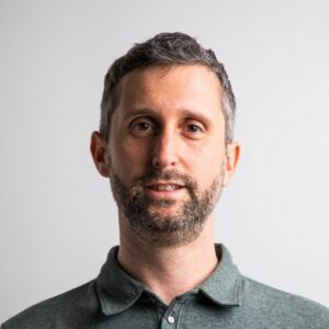 Headshot of Aaron Zollman.