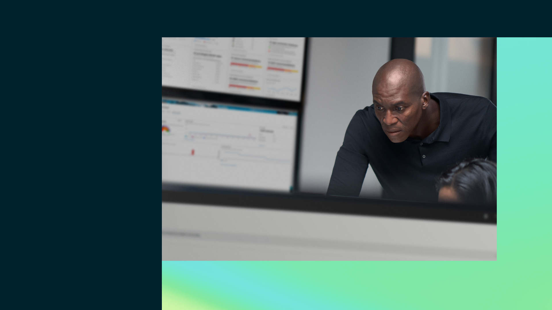 Chief information security officer collaborating in a security operations center.