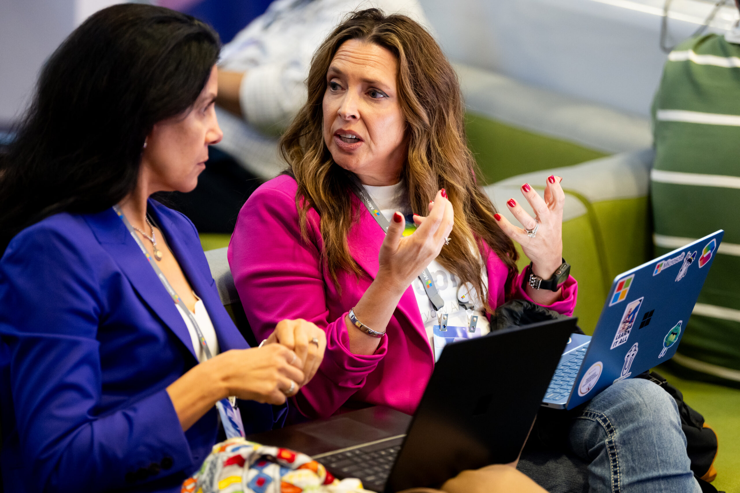 Two women networking at Microsoft Ignite 2025.