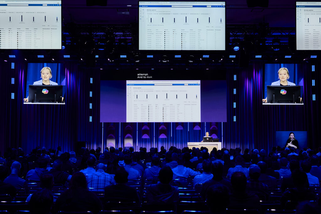 A photo of a security session stage from Microsoft Ignite 2025.
