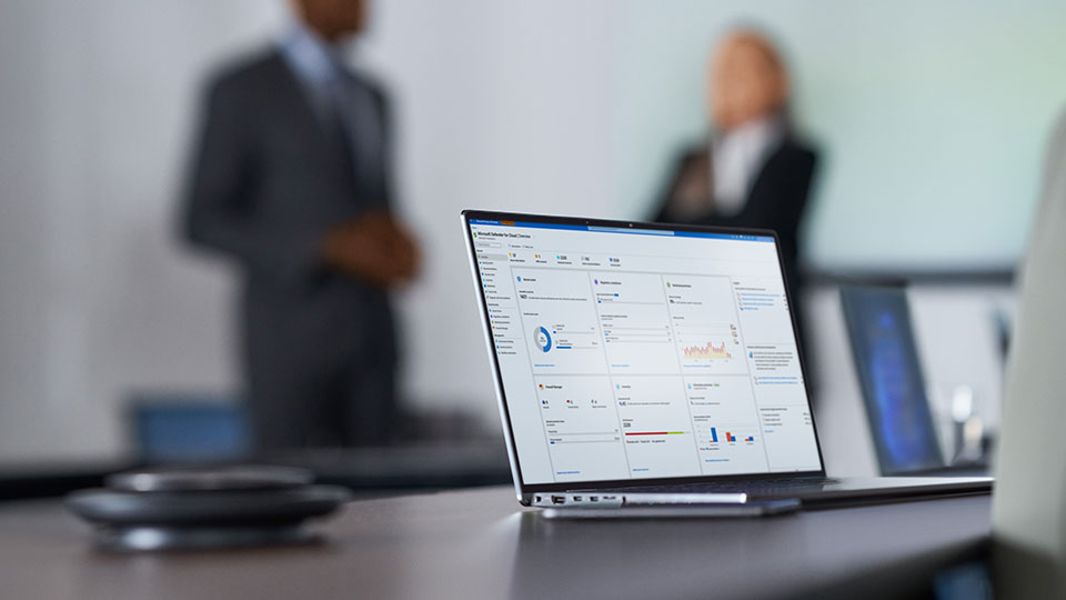 A closeup of a laptop in an office