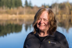 Garrison smiles in a portrait photo.