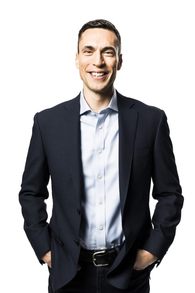 A photo of Spataro smiling.