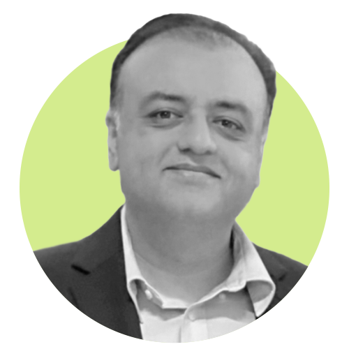 Nasir is shown in a portrait photo.