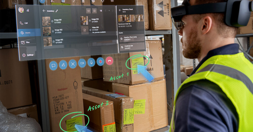 HoloLens を装着して MR でマニュアルを確認する男性