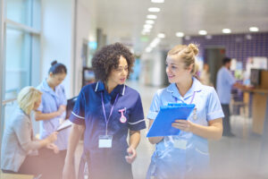 senior staff nurse with junior nurse