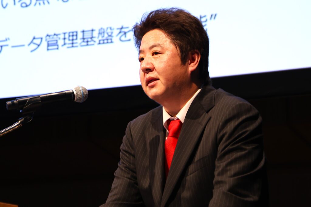 a man speaking into a microphone