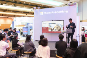 a person giving a presentation to a group of people