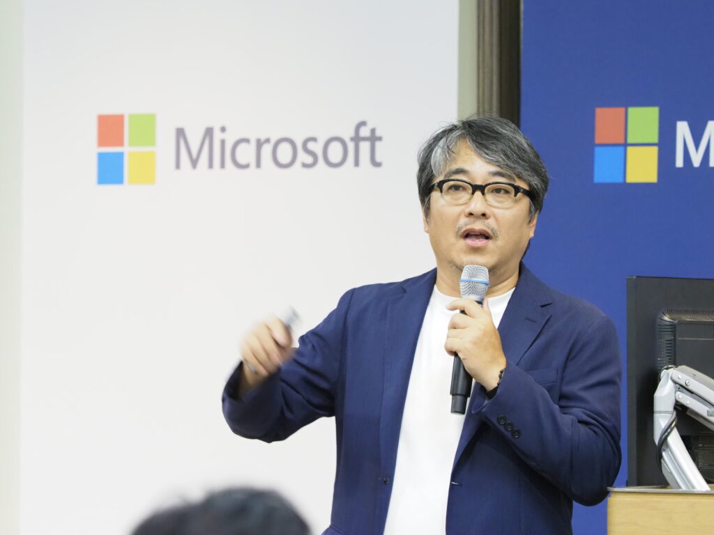 a man speaking into a microphone