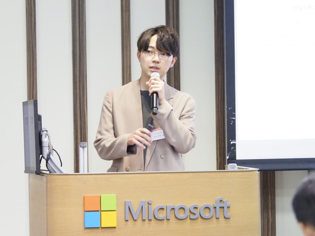 a person speaking into a microphone