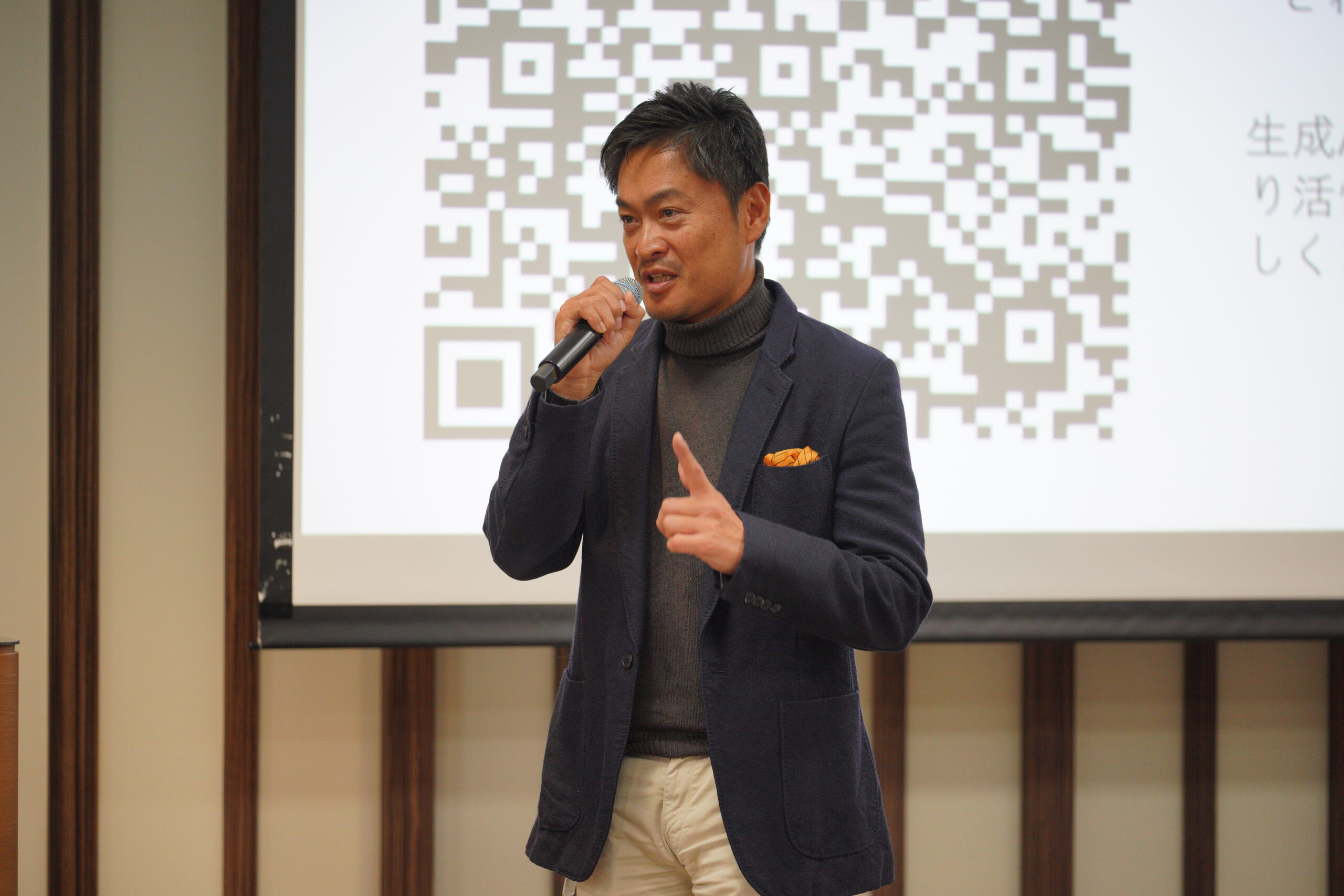 A man speaking into a microphone