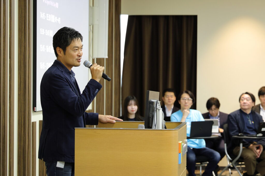A man speaking into a microphone