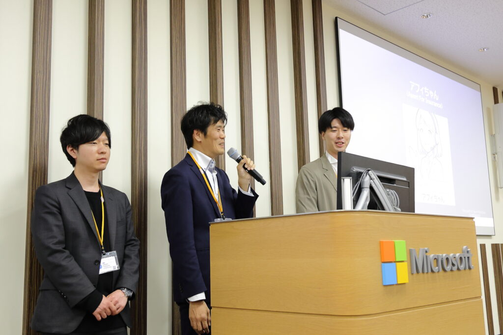 A group of people standing at a podium