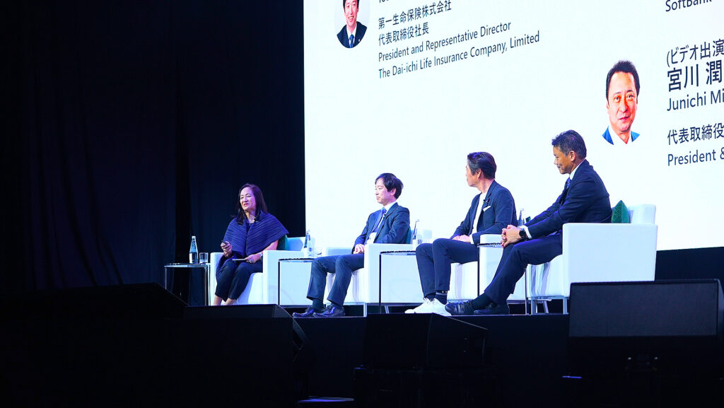 A group of people sitting on chairs