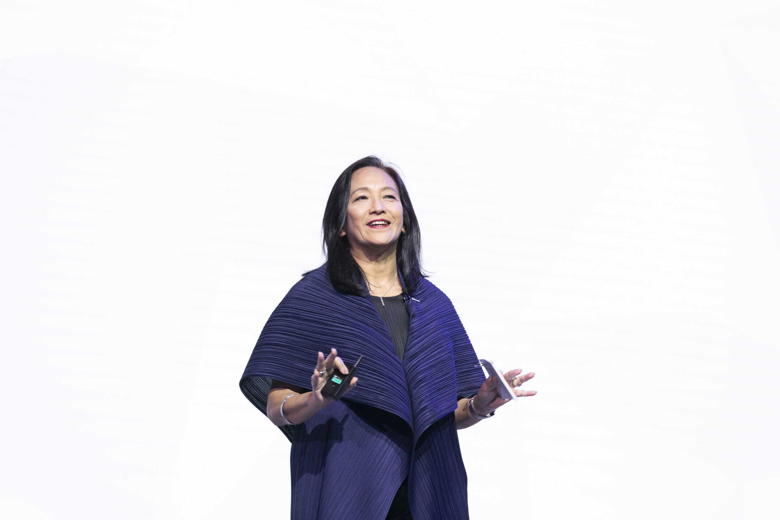 A woman in a blue cape