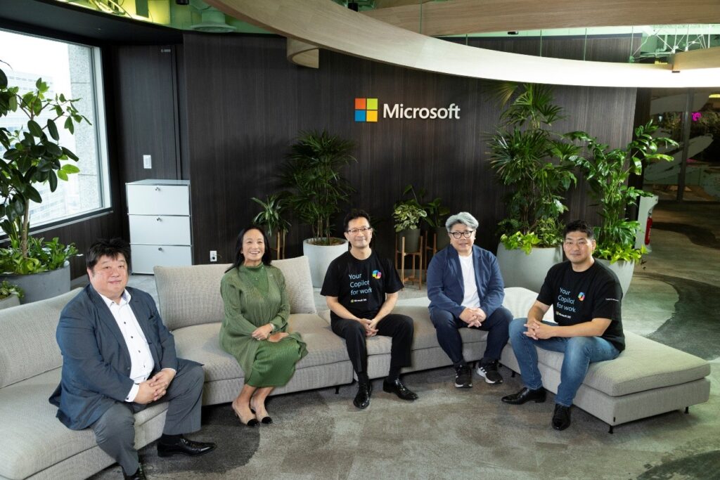 A group of people sitting on a couch