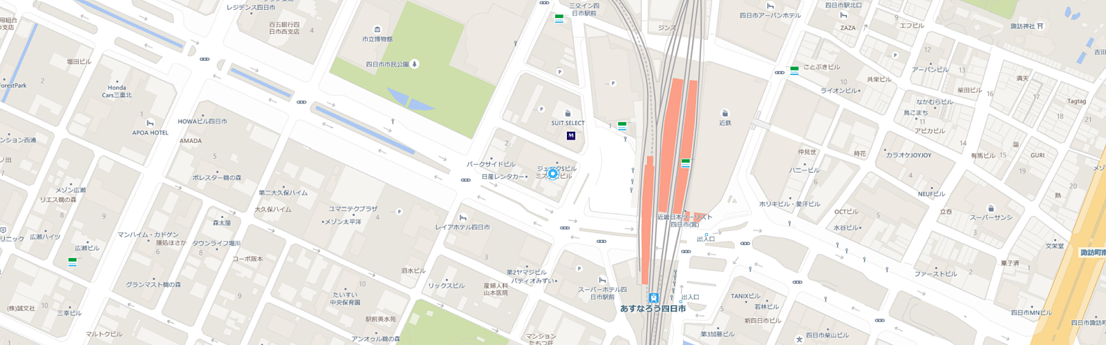 四日市周辺の地図で、道路、建物、鉄道線路が描かれています。